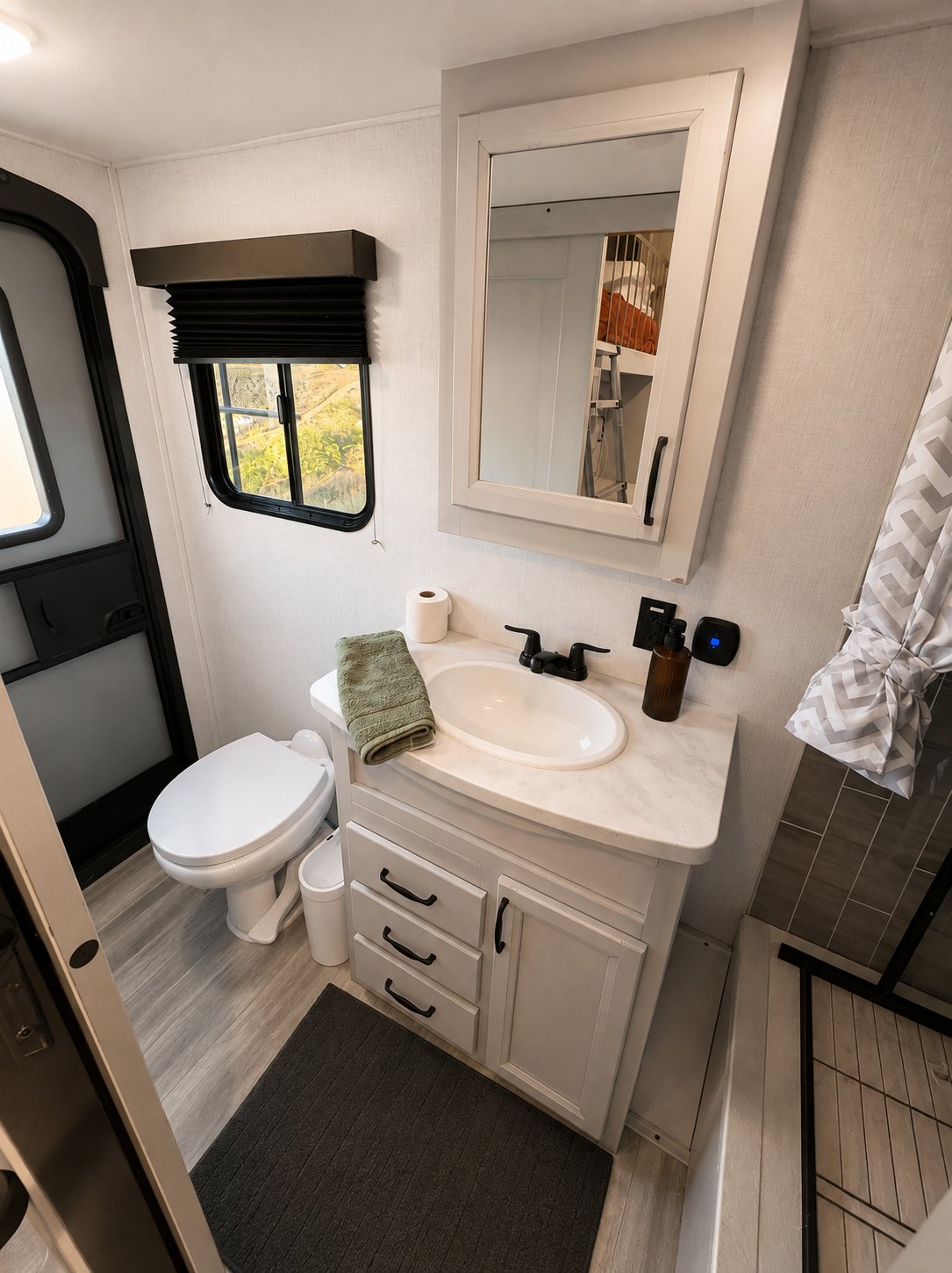 Half bathroom with vanity and mirror