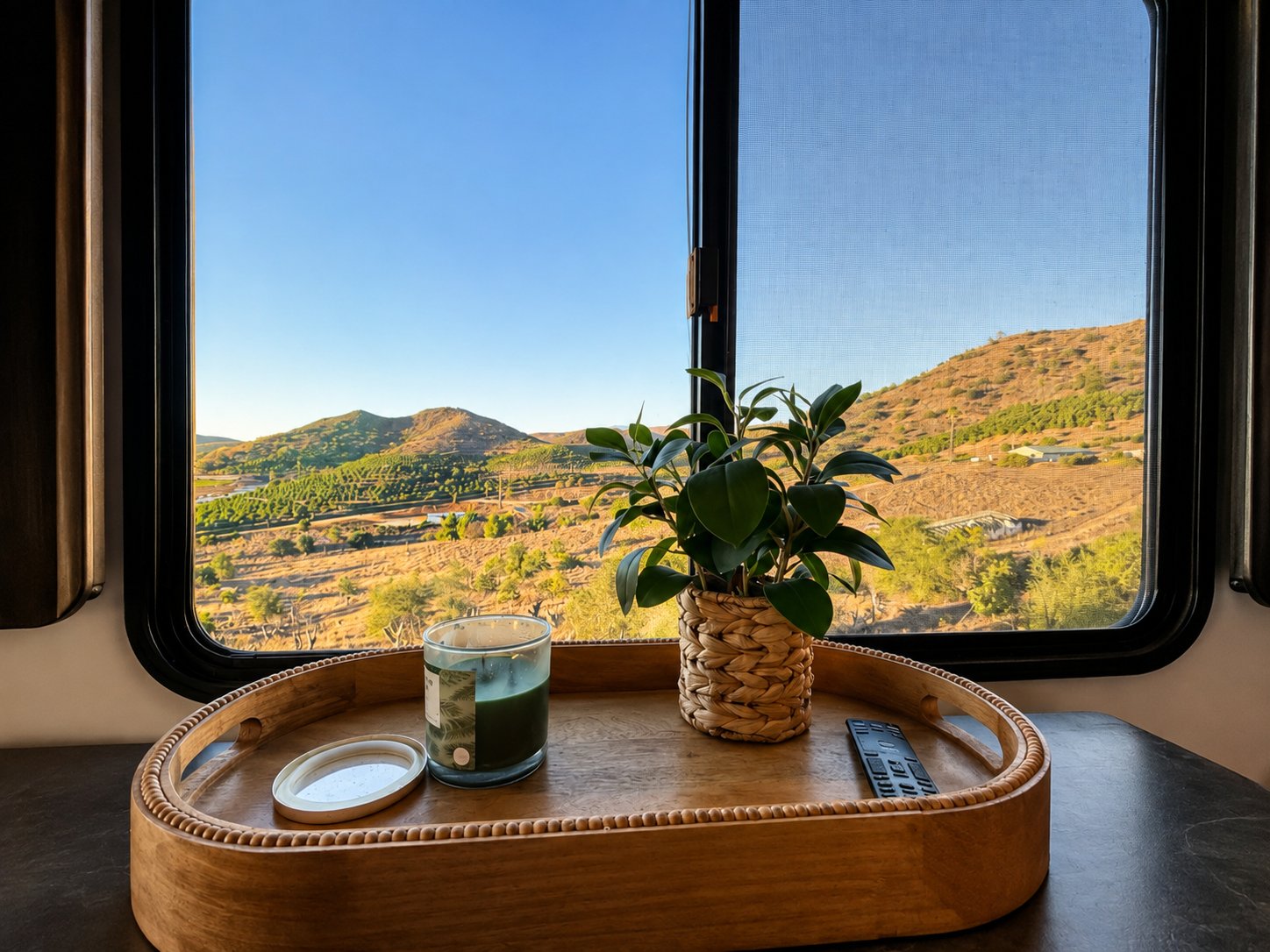 View of the golden hills and groves from the dining table window